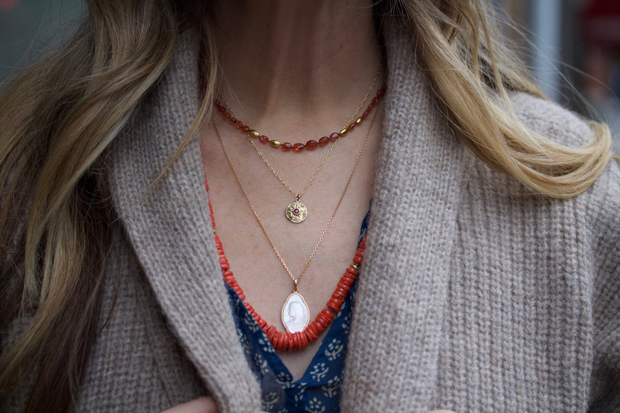 Carved Petal Pendant with Ruby