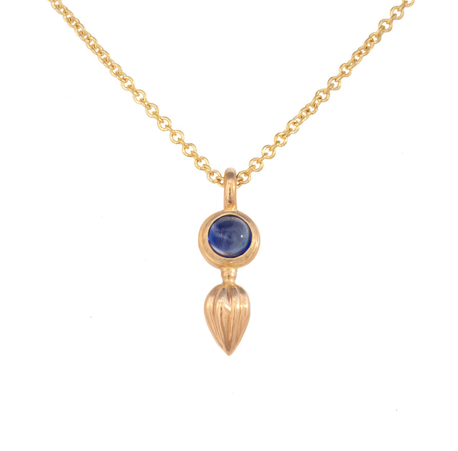 Sapphire Pendant with 18k Gold Carved Detail