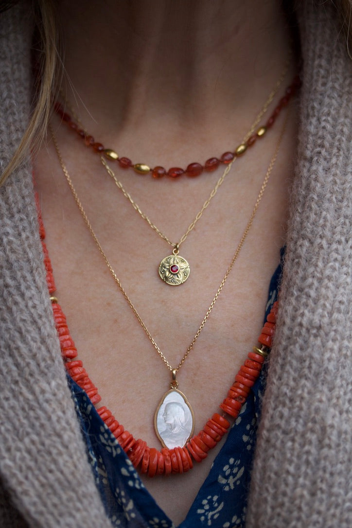 Carved Petal Pendant with Ruby