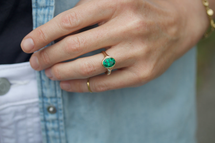 Lunette Style Ring with Emerald