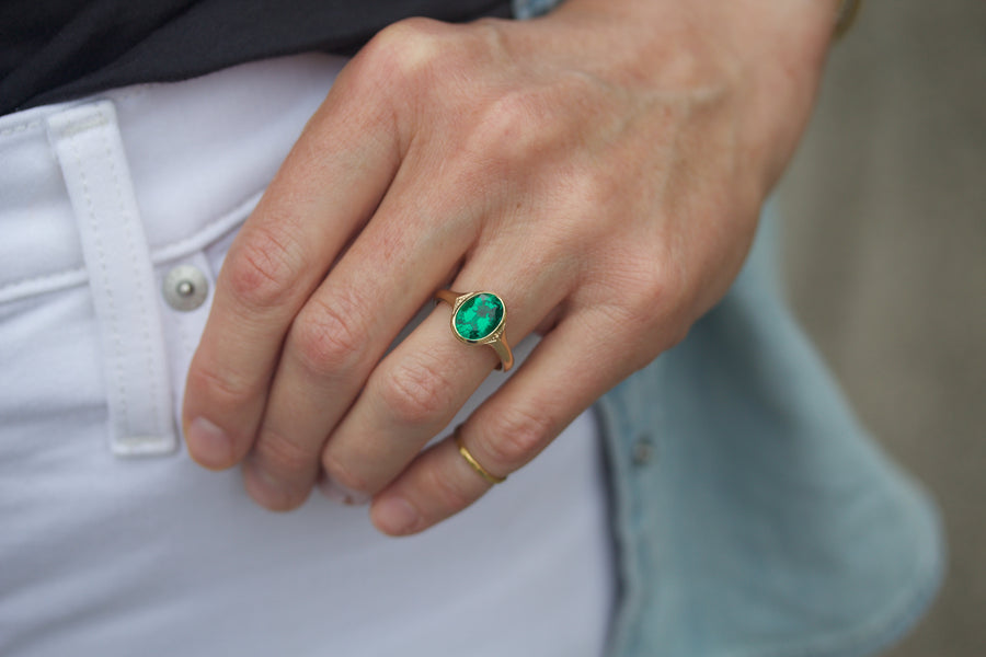 Lunette Style Ring with Emerald