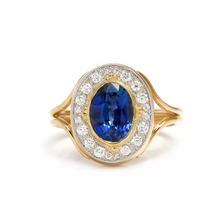 Blue Sapphire Ring with Surrounding Diamonds