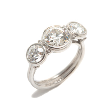 European Cut Diamond Three Stone Lunette Style Ring