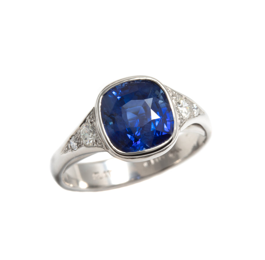 Cushion Cut Blue Sapphire Lunette Style Ring in Platinum