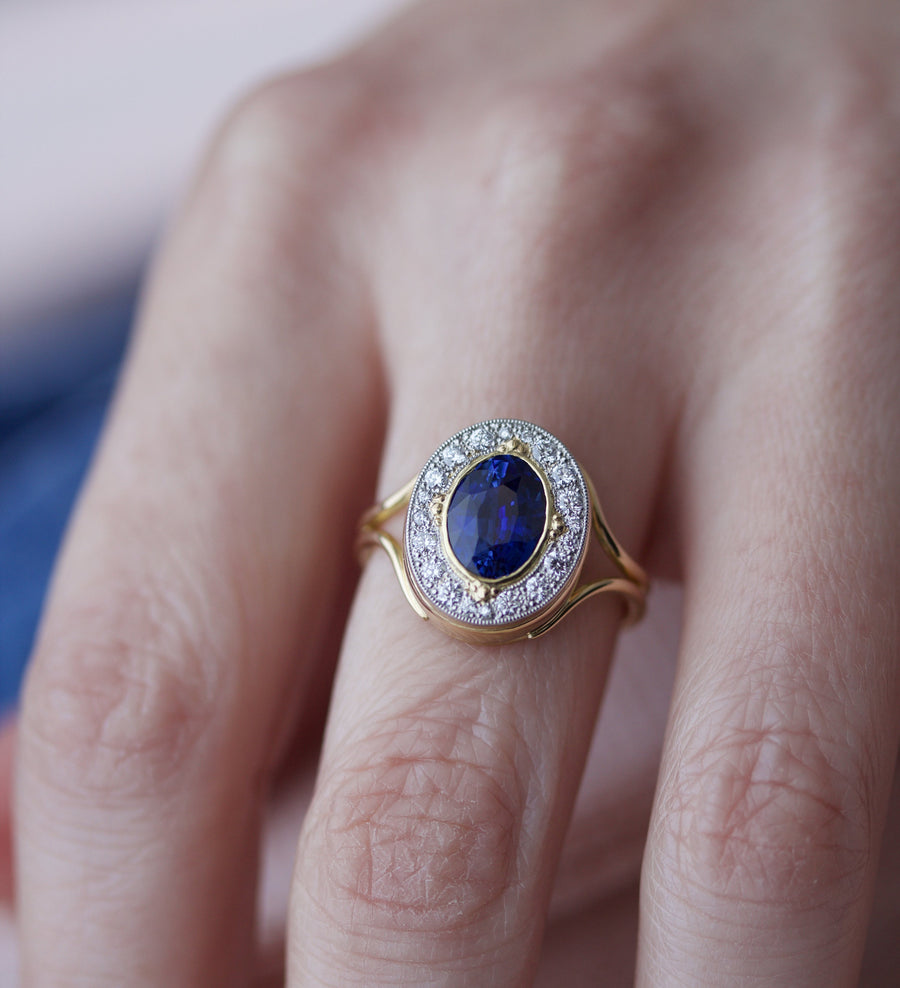 Blue Sapphire Ring with Surrounding Diamonds